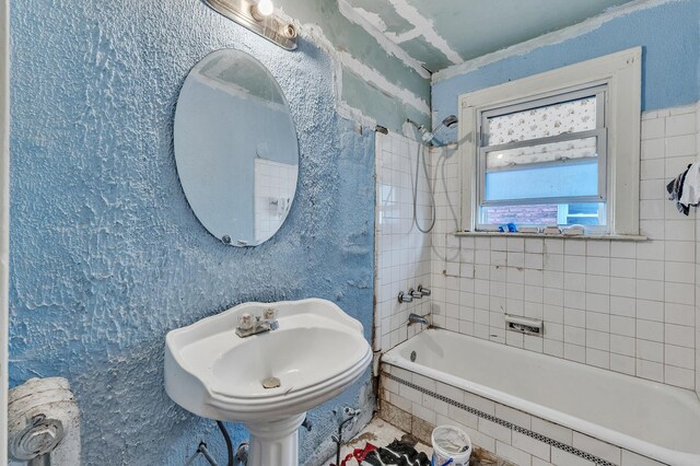 15885 Indiana St, Detroit, MI 48238 - bathroom with tiled shower / bath combo and a sink