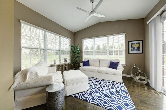 51583 Turnburry Dr, South Lyon, MI 48178 - living room featuring dark wood-style flooring, ceiling fan, plenty of natural light, and lofted ceiling
