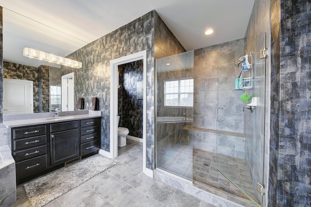 51583 Turnburry Dr, South Lyon, MI 48178 - bathroom featuring vanity, tile patterned floors, a stall shower, and toilet