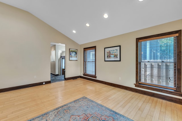 1115 Henry St, Ann Arbor, MI 48104 - unfurnished room with light wood-style flooring, recessed lighting, and high vaulted ceiling
