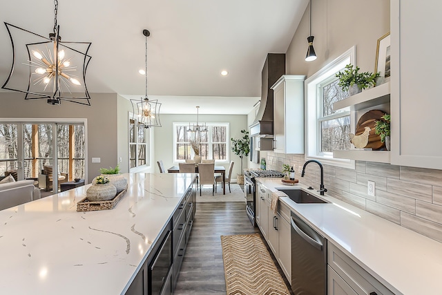 5215 Grande View Ln, Jackson, MI 49201 - kitchen with decorative backsplash, open shelves, a sink, a chandelier, and stainless steel appliances