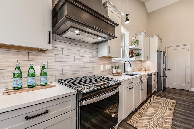 5215 Grande View Ln, Jackson, MI 49201 - kitchen featuring open shelves, premium range hood, light countertops, a sink, and appliances with stainless steel finishes