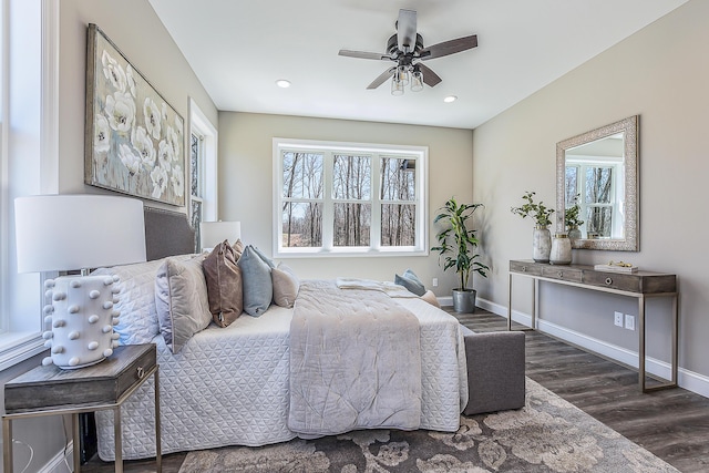 5215 Grande View Ln, Jackson, MI 49201 - bedroom featuring baseboards, wood finished floors, and multiple windows
