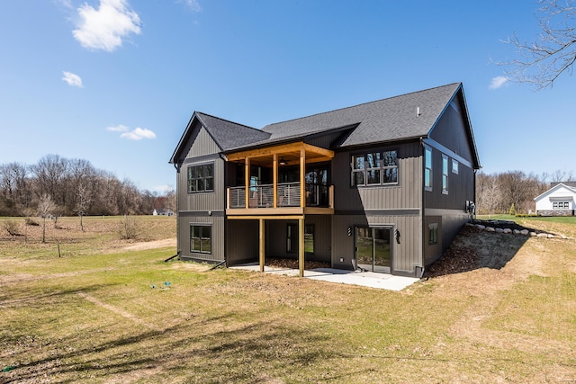 5215 Grande View Ln, Jackson, MI 49201 - back of house featuring a lawn, a patio, and roof with shingles
