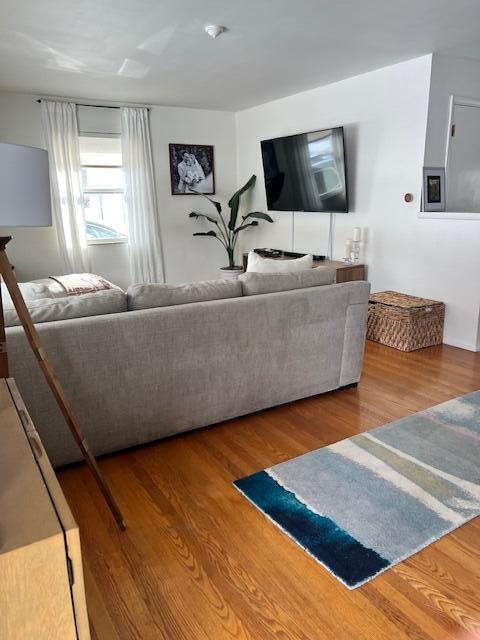 living room with wood finished floors