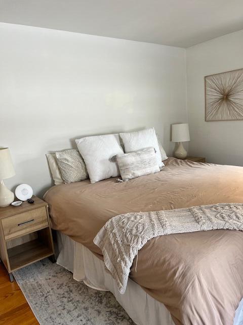 bedroom featuring wood finished floors