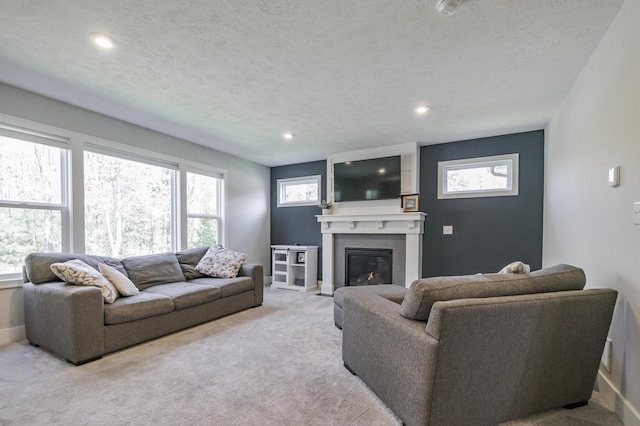 14411 Windway Dr, Grand Haven, MI 49417 - living room with recessed lighting, a fireplace, baseboards, and carpet floors