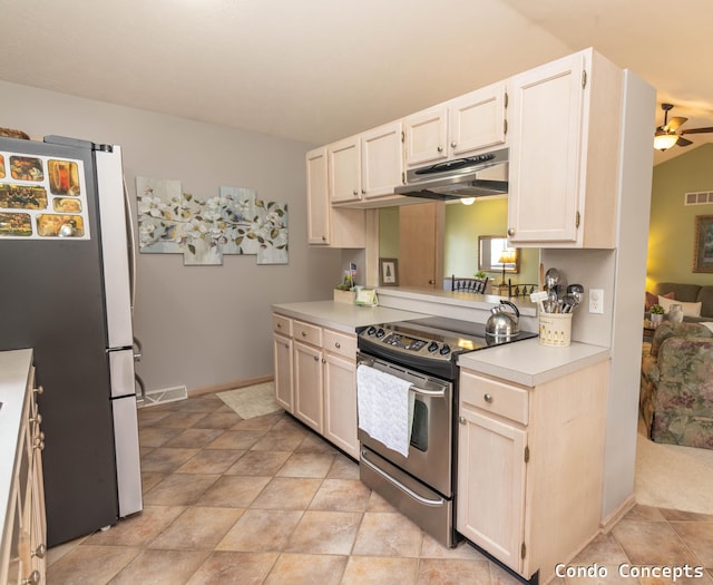 kitchen with ceiling fan, appliances with stainless steel finishes, light countertops, under cabinet range hood, and visible vents
