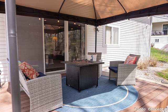 wooden deck featuring a gazebo