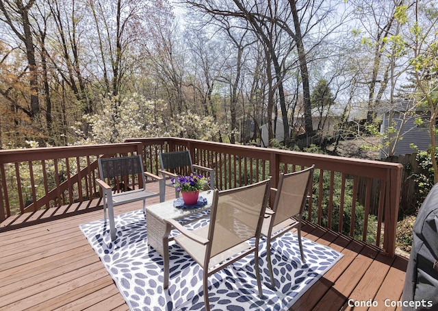 deck featuring outdoor dining area