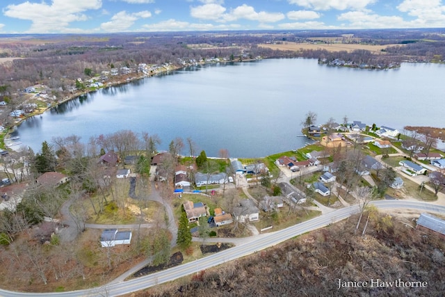 birds eye view of property with a residential view and a water view