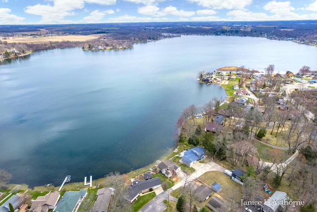 birds eye view of property featuring a residential view and a water view
