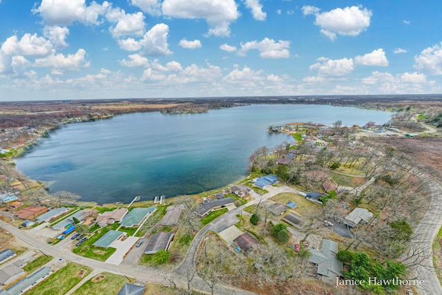 aerial view with a residential view and a water view