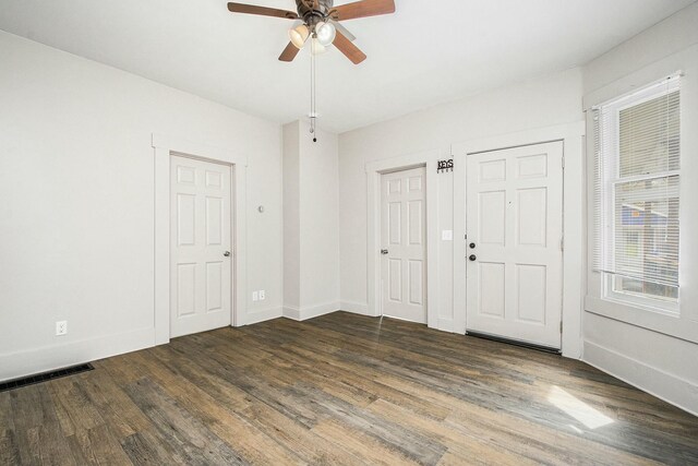 311 Robey Pl SE, Grand Rapids, MI 49506 - interior space featuring wood finished floors, visible vents, a ceiling fan, and baseboards