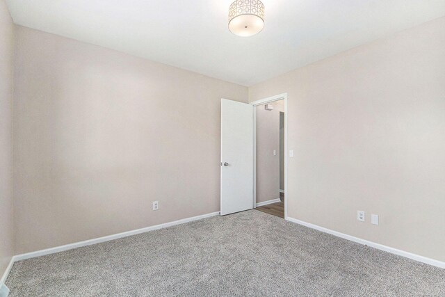 5984 Leisure S Dr SE, Grand Rapids, MI 49548 - unfurnished room featuring baseboards and carpet
