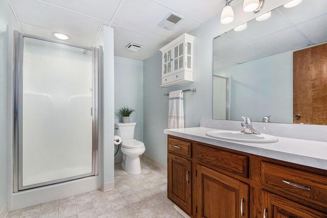 5984 Leisure S Dr SE, Grand Rapids, MI 49548 - bathroom with visible vents, baseboards, toilet, and a shower stall