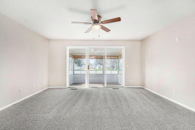 5984 Leisure S Dr SE, Grand Rapids, MI 49548 - empty room featuring baseboards, carpet flooring, and ceiling fan