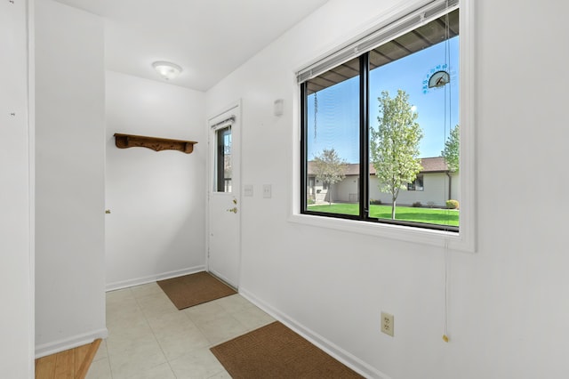 5160 Green Meadow Rd, Kalamazoo, MI 49009 - doorway to outside featuring baseboards