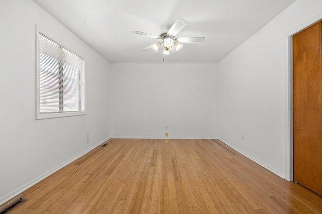 5160 Green Meadow Rd, Kalamazoo, MI 49009 - spare room with a ceiling fan, baseboards, visible vents, and light wood-type flooring