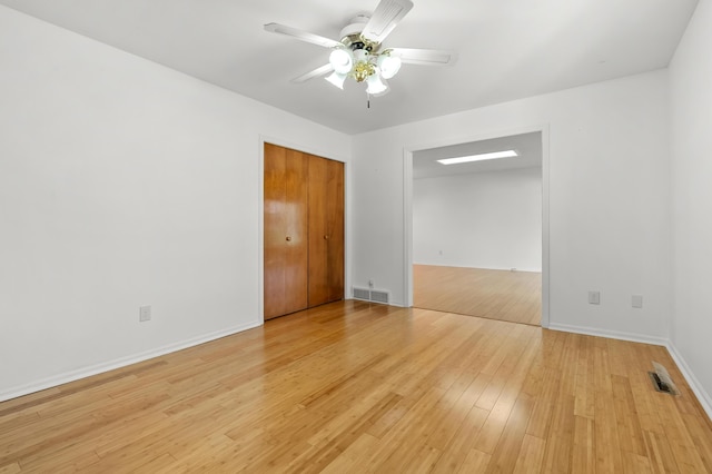 5160 Green Meadow Rd, Kalamazoo, MI 49009 - unfurnished room with a ceiling fan, baseboards, visible vents, and light wood-type flooring