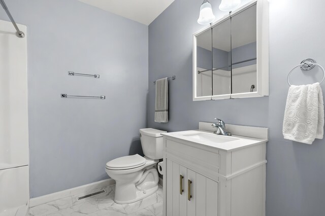 5160 Green Meadow Rd, Kalamazoo, MI 49009 - full bath featuring visible vents, baseboards, vanity, toilet, and marble finish floor