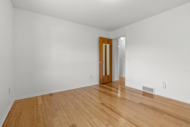 5160 Green Meadow Rd, Kalamazoo, MI 49009 - spare room featuring baseboards, visible vents, and light wood finished floors
