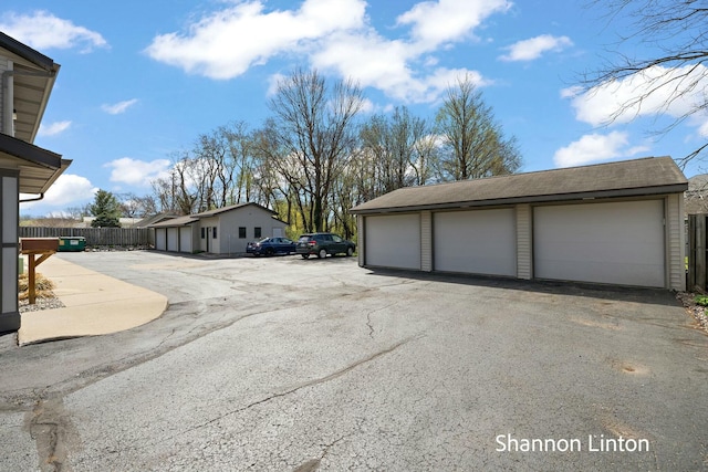 garage with fence