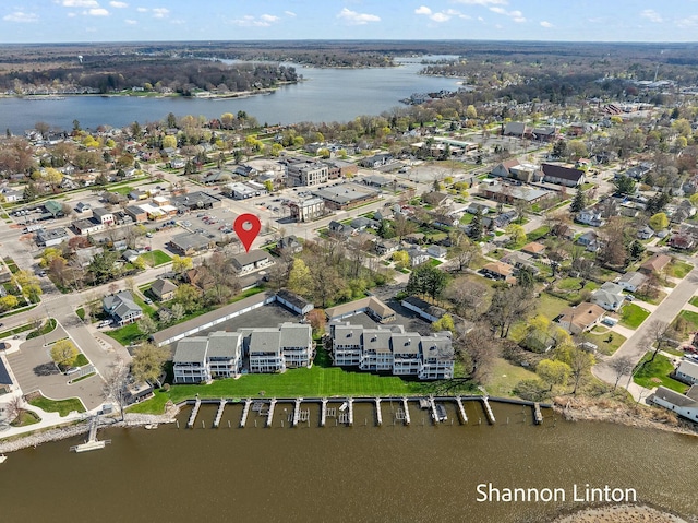 aerial view with a water view and a residential view