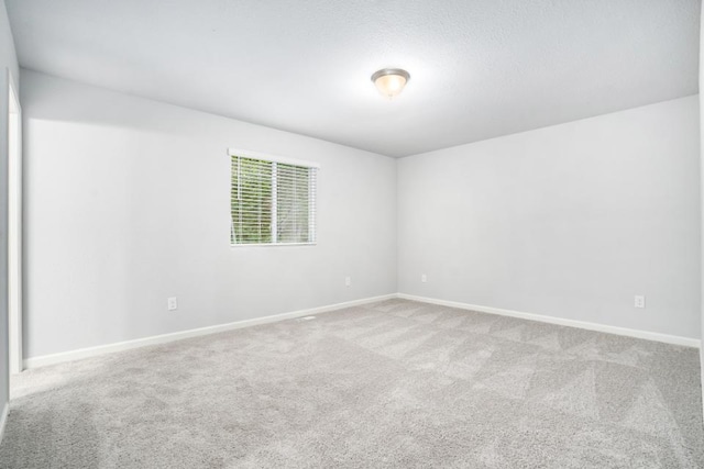 2710 Sanderling Ct, Grand Rapids, MI 49505 - carpeted spare room with baseboards