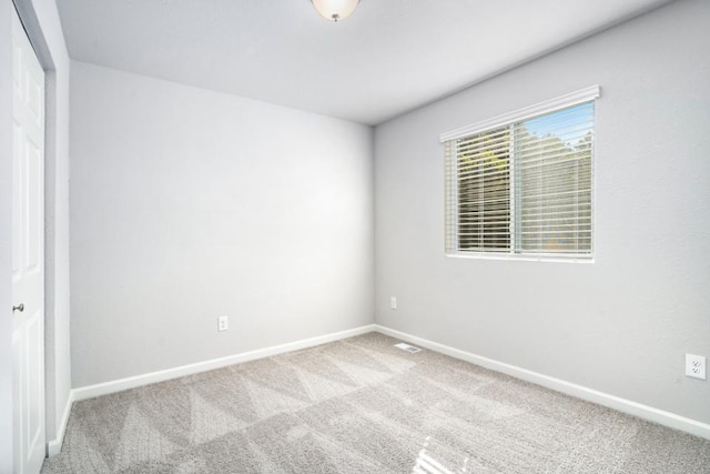 2710 Sanderling Ct, Grand Rapids, MI 49505 - carpeted spare room featuring baseboards