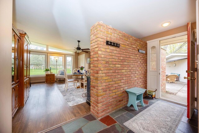 5009 John Holmes Rd, Ann Arbor, MI 48103 - sunroom / solarium with a ceiling fan, french doors, brick wall, and wood finished floors