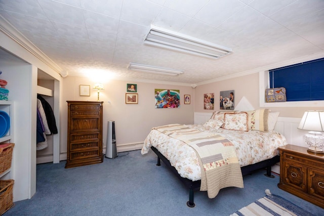 5009 John Holmes Rd, Ann Arbor, MI 48103 - carpeted bedroom featuring ornamental molding and a baseboard heating unit