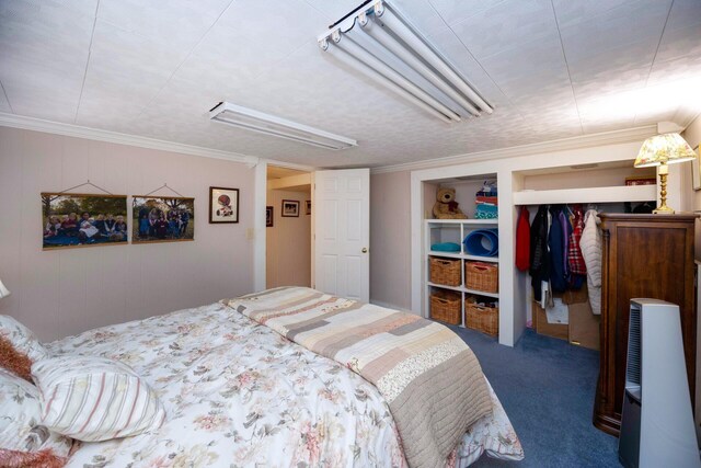 5009 John Holmes Rd, Ann Arbor, MI 48103 - carpeted bedroom featuring attic access and ornamental molding