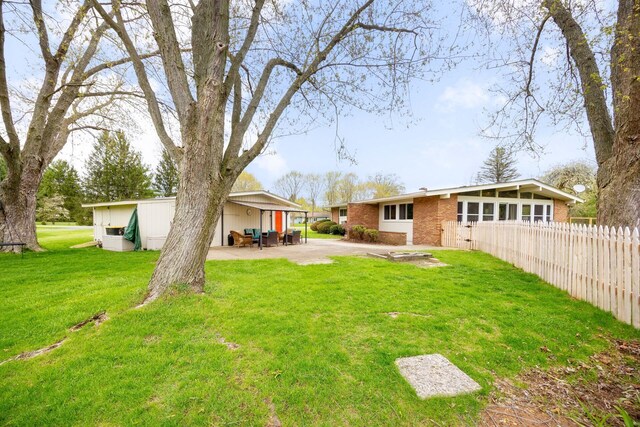 5009 John Holmes Rd, Ann Arbor, MI 48103 - view of yard featuring a patio