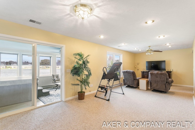sitting room featuring ceiling fan, visible vents, carpet floors, baseboards, and recessed lighting