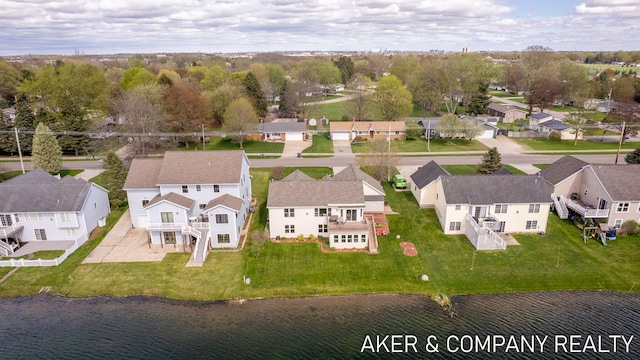 aerial view featuring a water view and a residential view