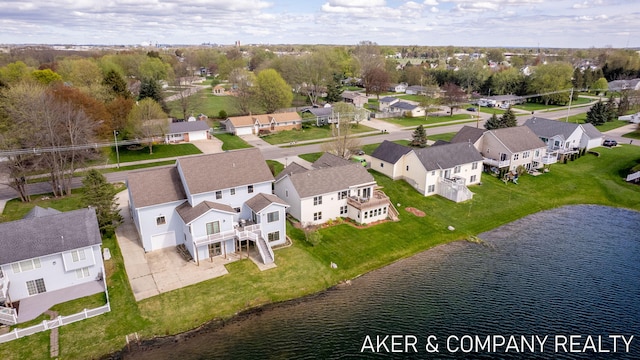 aerial view featuring a water view and a residential view