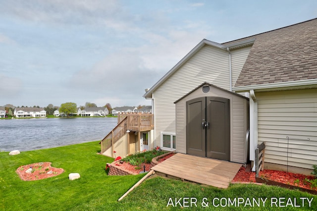 view of shed featuring a water view
