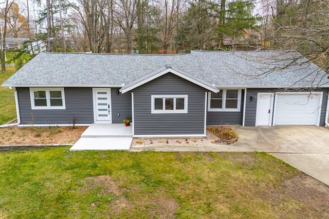 10985 E Cd Ave, Richland, MI 49083 - single story home with a front lawn, driveway, a shingled roof, and an attached garage