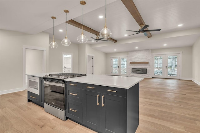 10985 E Cd Ave, Richland, MI 49083 - kitchen with beam ceiling, ceiling fan, stainless steel appliances, and recessed lighting