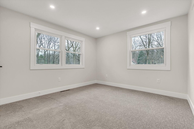 10985 E Cd Ave, Richland, MI 49083 - empty room featuring recessed lighting, visible vents, a wealth of natural light, and baseboards