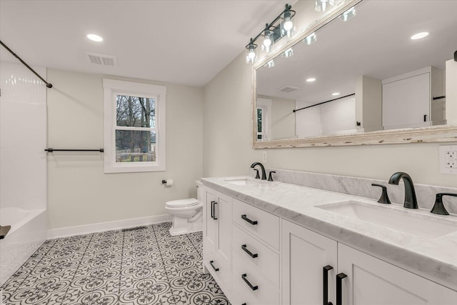 10985 E Cd Ave, Richland, MI 49083 - full bathroom featuring baseboards, visible vents, toilet, and a sink