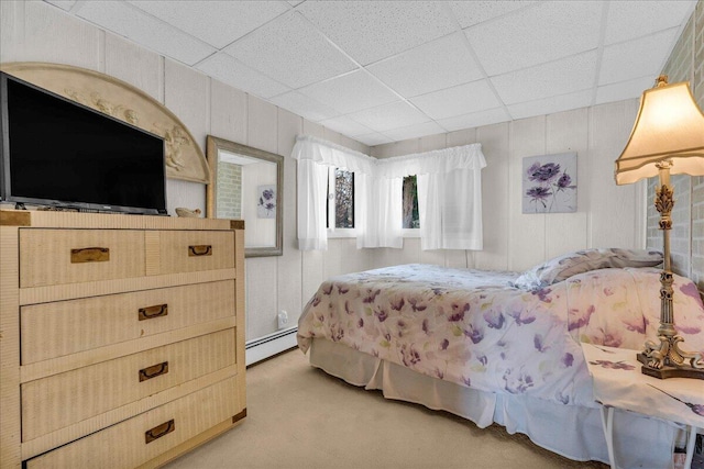 7226 Lakeview Dr, Lexington, MI 48450 - bedroom featuring light colored carpet, a baseboard radiator, and a paneled ceiling