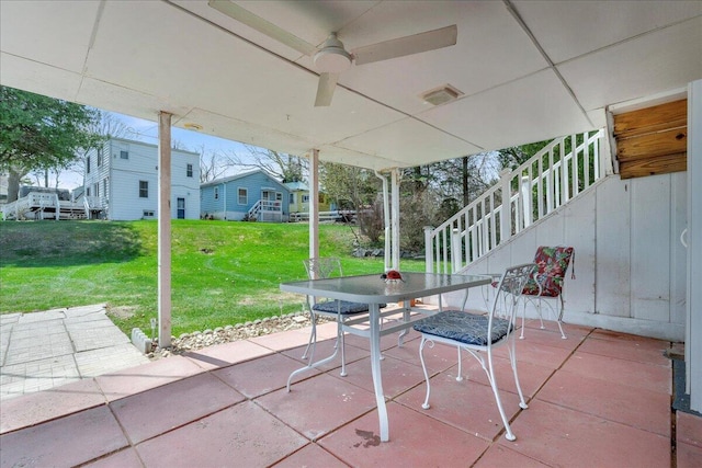 7226 Lakeview Dr, Lexington, MI 48450 - view of patio featuring stairway and outdoor dining space