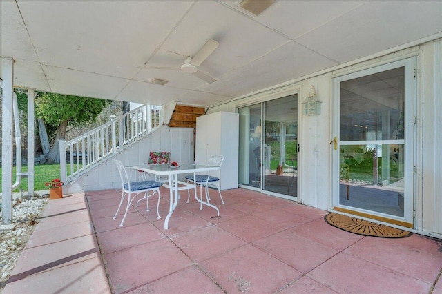 7226 Lakeview Dr, Lexington, MI 48450 - view of patio featuring ceiling fan and stairway