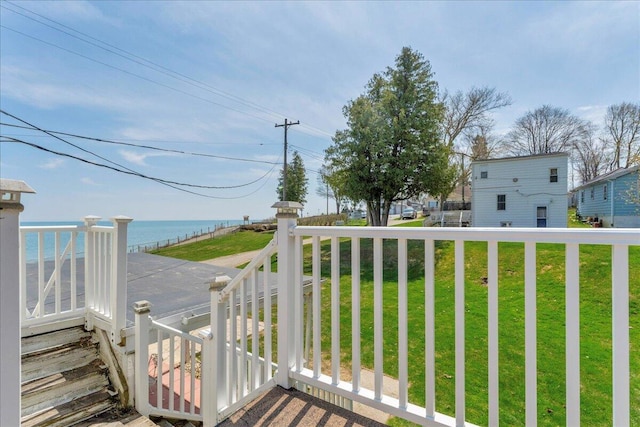 7226 Lakeview Dr, Lexington, MI 48450 - wooden terrace featuring a lawn and a water view