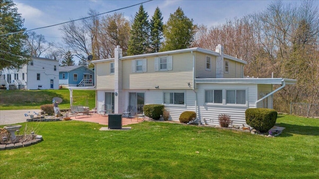 7226 Lakeview Dr, Lexington, MI 48450 - rear view of property featuring a chimney, a patio, a yard, and central air condition unit