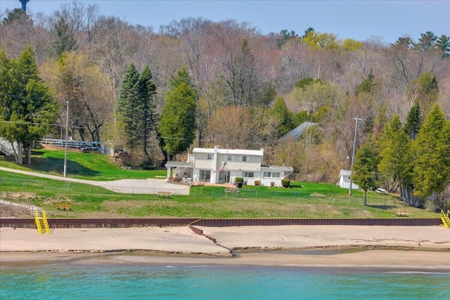 7226 Lakeview Dr, Lexington, MI 48450 - rear view of property featuring a water view and a forest view