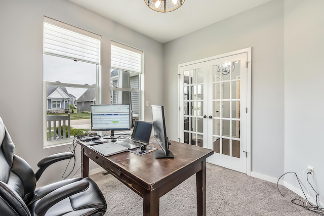 carpeted office featuring baseboards and french doors