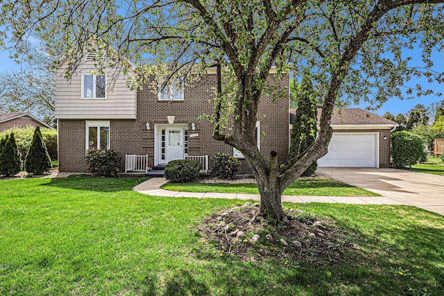 2038 S 7th St, Ann Arbor, MI 48103 - view of front of house with brick siding, driveway, a front yard, and a garage